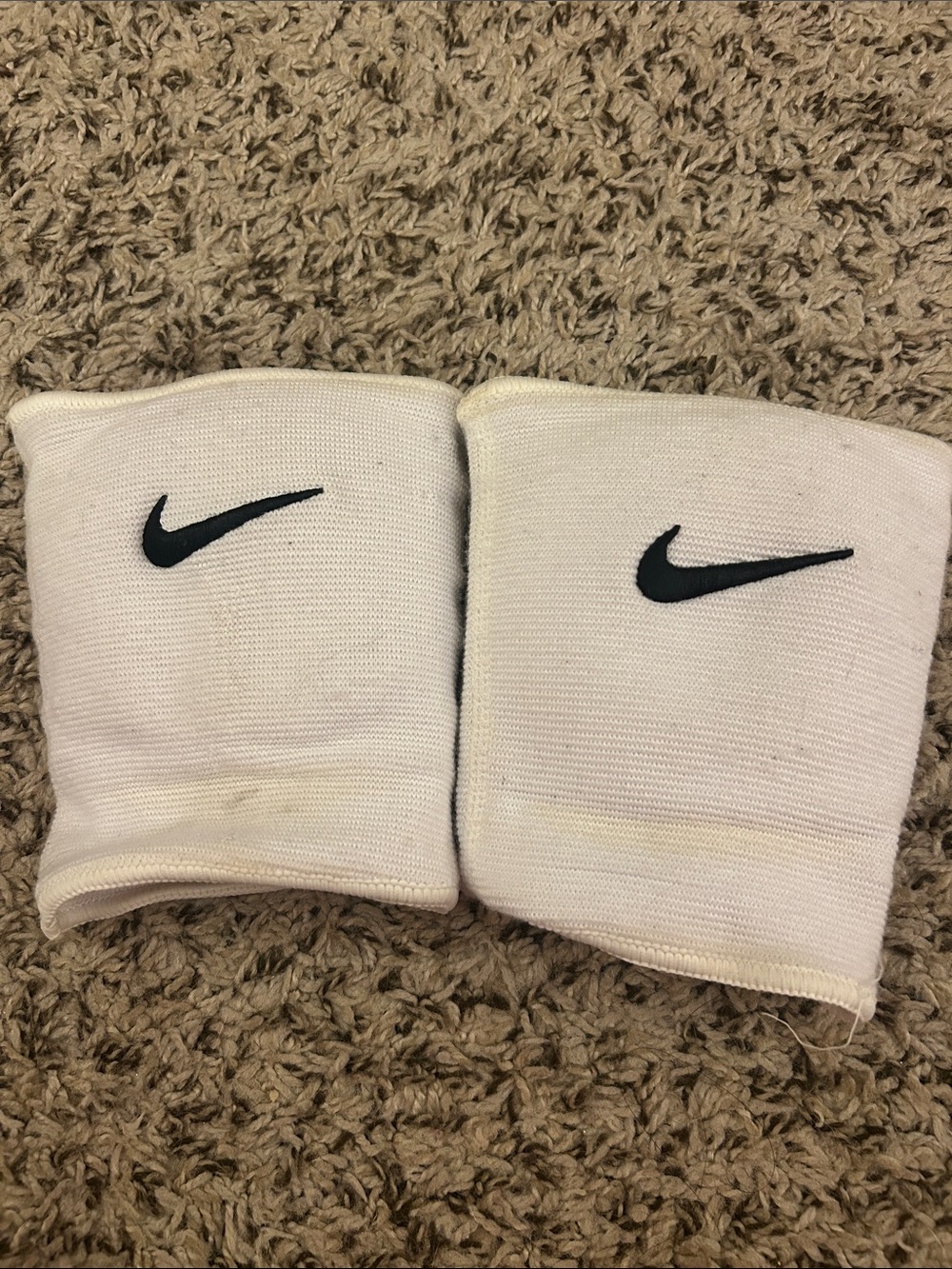 Nike White Knee Pads with Black Swoosh Logo